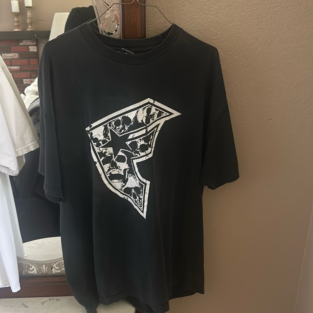 Famous stars and straps tshirt. Men’s XL. Black on white and letters with skulls